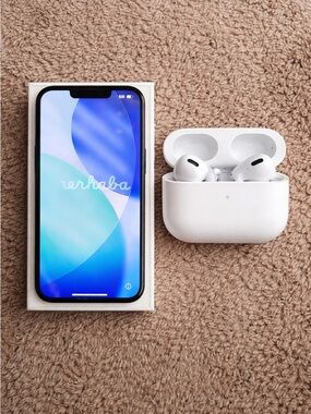 Apple iPhone 16E & Pods; small chip but great condition. See photos